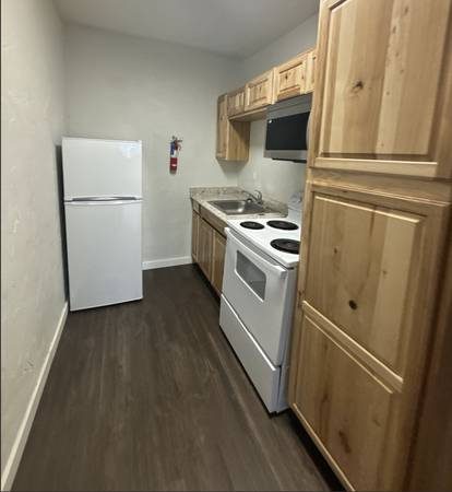 Kitchen with alder cabinets at 1002 Cushman