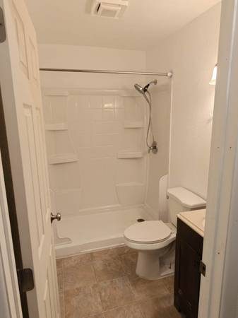 Bathroom with new tub surround at 1010 Cushman